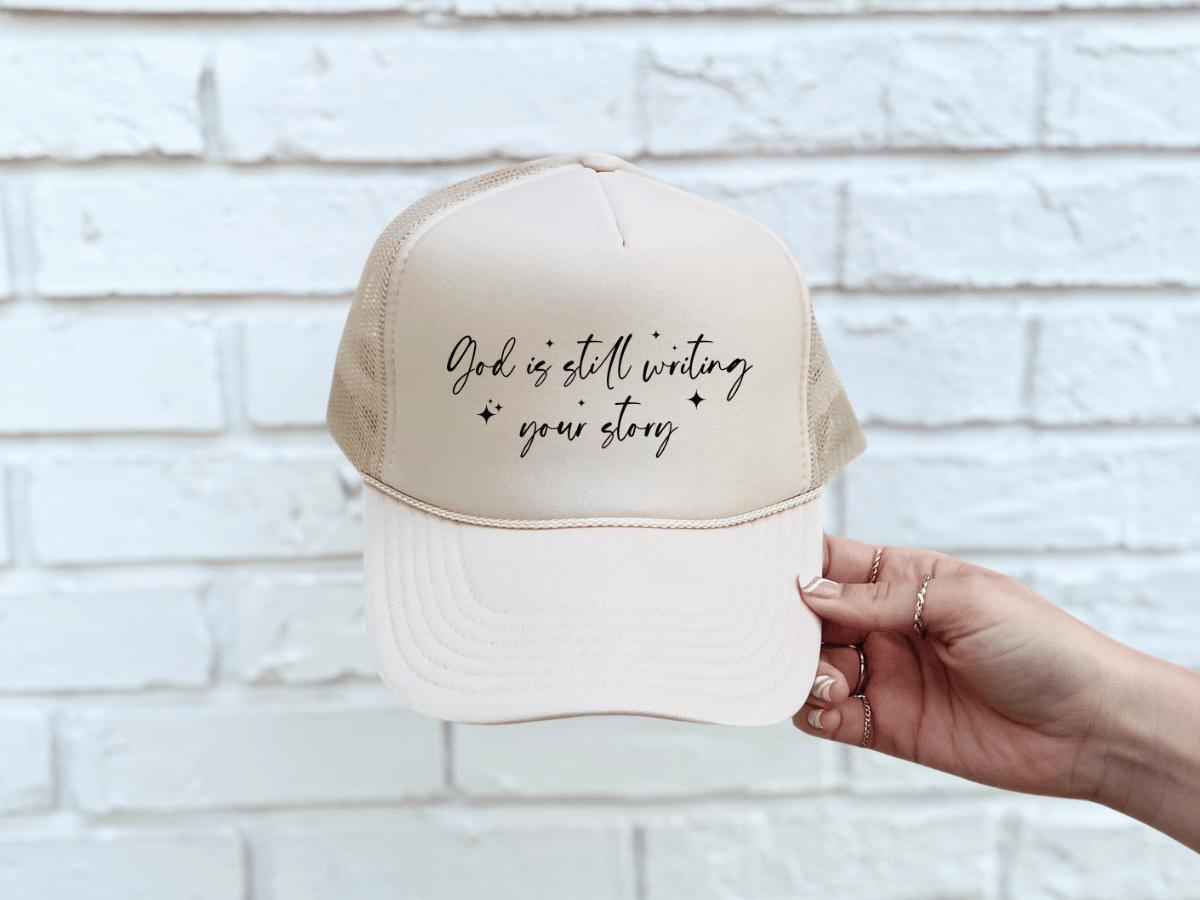 God Is still Writing Your Story Trucker Hat